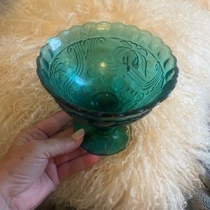 Vintage teal blue glass chalace dish approx 5 “ across and tall.